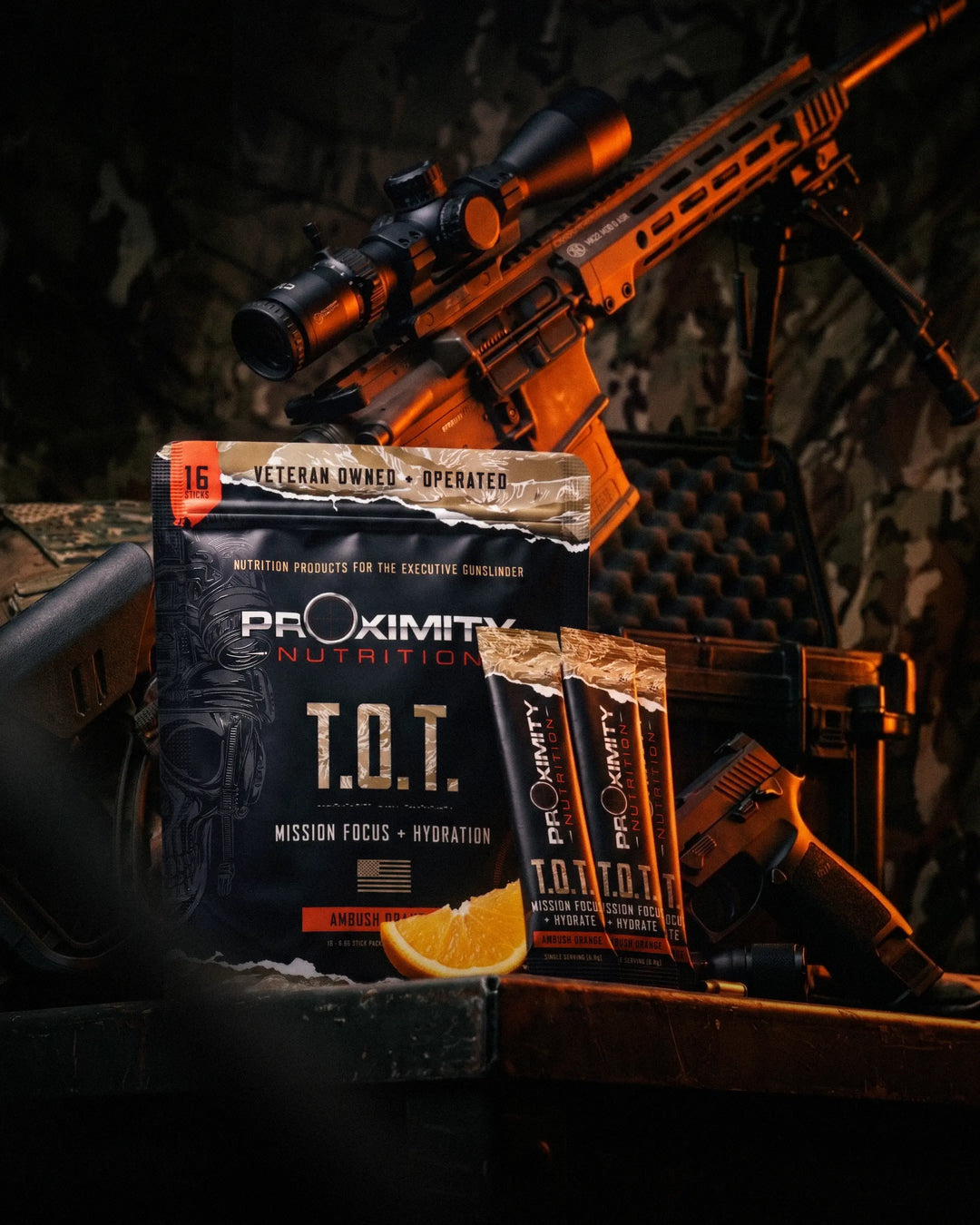 T.O.T. Ambush Orange pouch and stick packs with an orange wedge and tactical gear.
