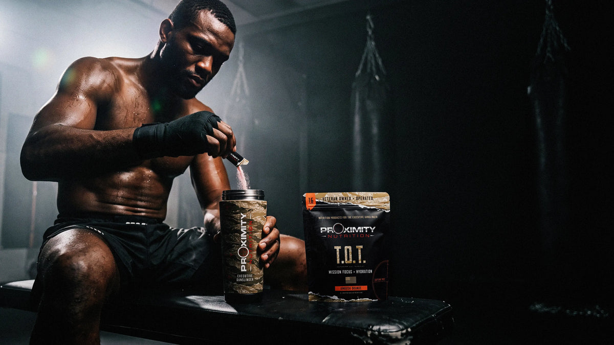 Combat athlete preparing T.O.T. beside a punching bag
